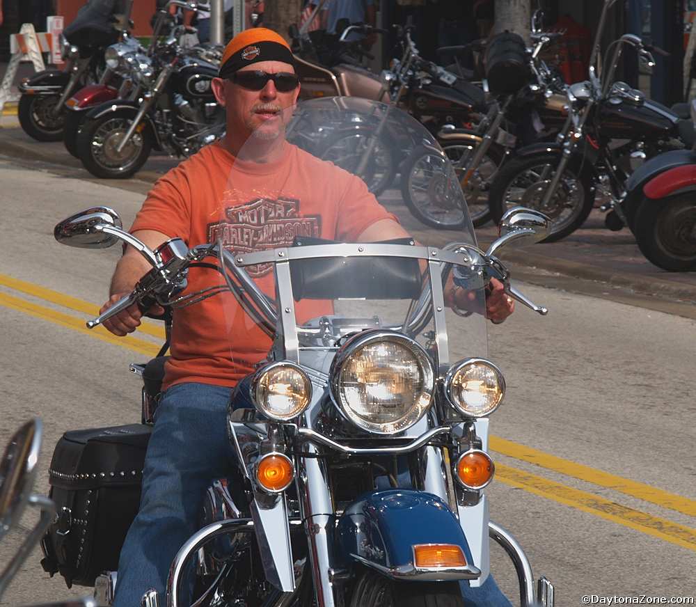 Orange Clad Biker on Harley