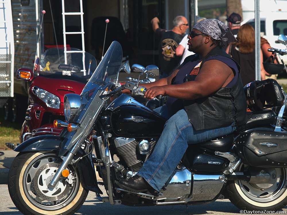 black biker on motorcycle